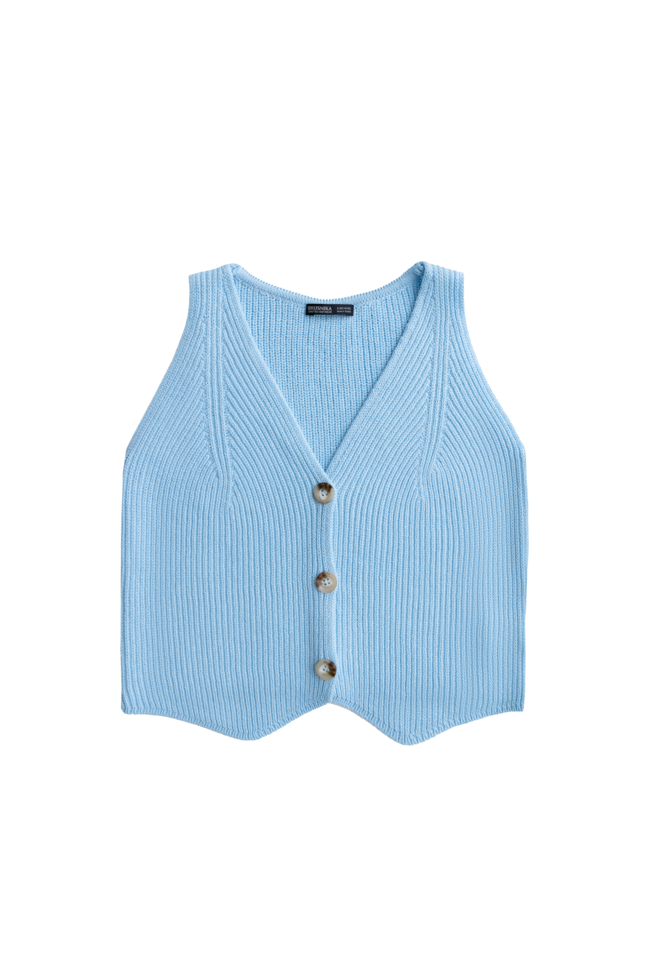 Трикотажный жилет из хлопка. Модель прямого кроя с V-образным вырезом и застежкой на пуговицы. Дополнить образ можно юбкой в таком же стиле.