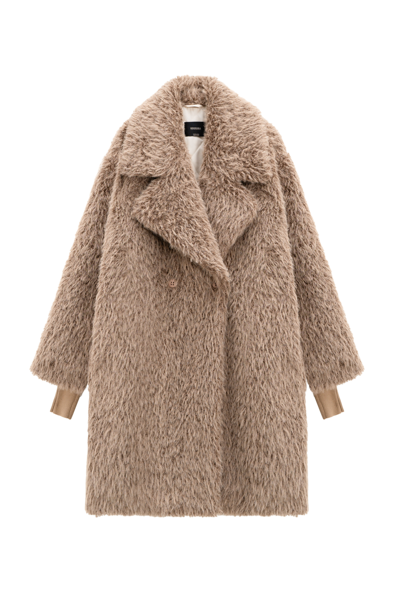 Объемная двубортная шуба длины миди из экомеха. Модель свободного силуэта со спущенной линией плеча,&nbsp;&nbsp;длинными трикотажными манжетами и застежкой на пуговицы. Изделие выполнено на подкладке.