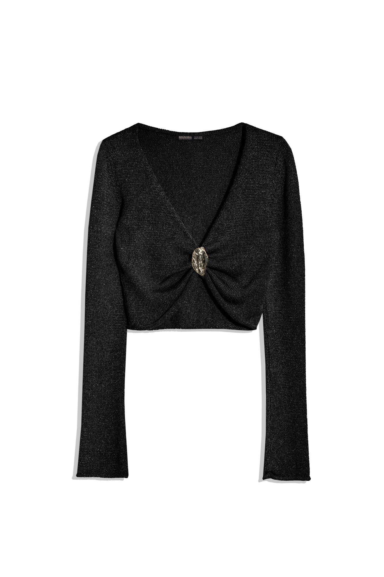 Трикотажный топ из вискозы с люрексом. Модель укороченного силуэта с длинными рукавами, валиками на манжетах, глубоким V-образным вырезом декольте и акцентным элементом на лифе.