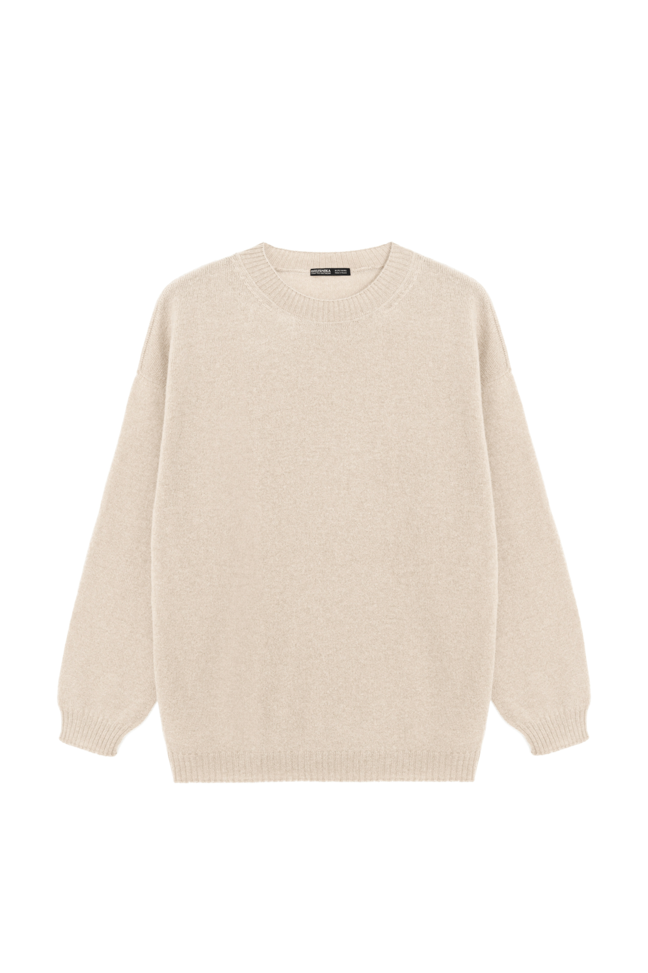 Трикотажный джемпер из 100% кашемира. Модель свободного силуэта со спущенной линией плеча и круглым вырезом горловины. Края изделия выполнены в рубчик.