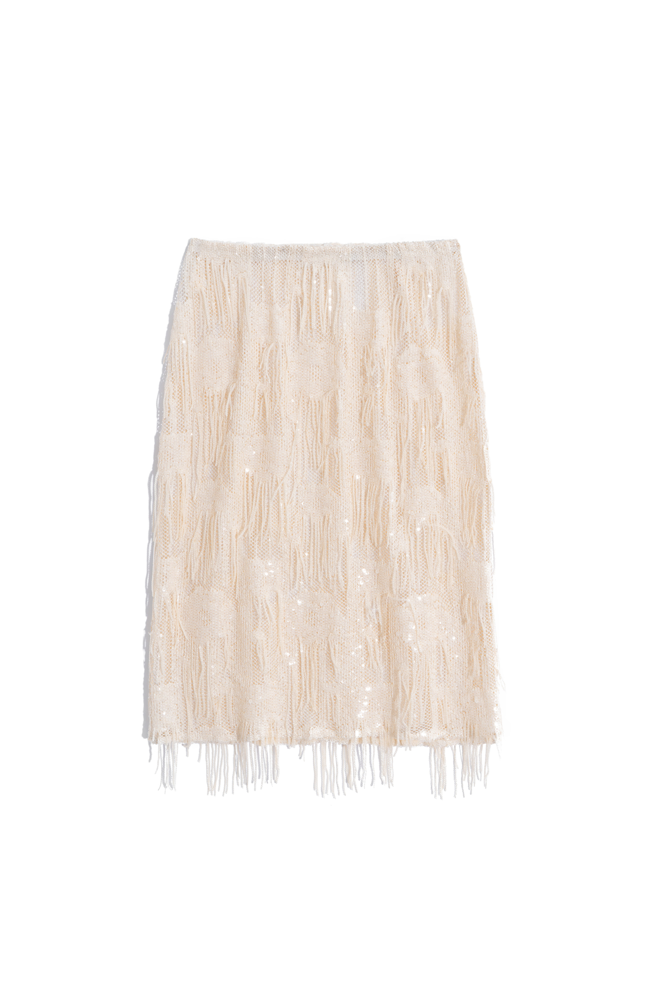 Юбка длины миди с геометрическим орнаментом, вышитым прозрачными пайетками. Модель декорирована россыпью пайеток и бахромой на подоле. Изделие выполнено без подкладки.