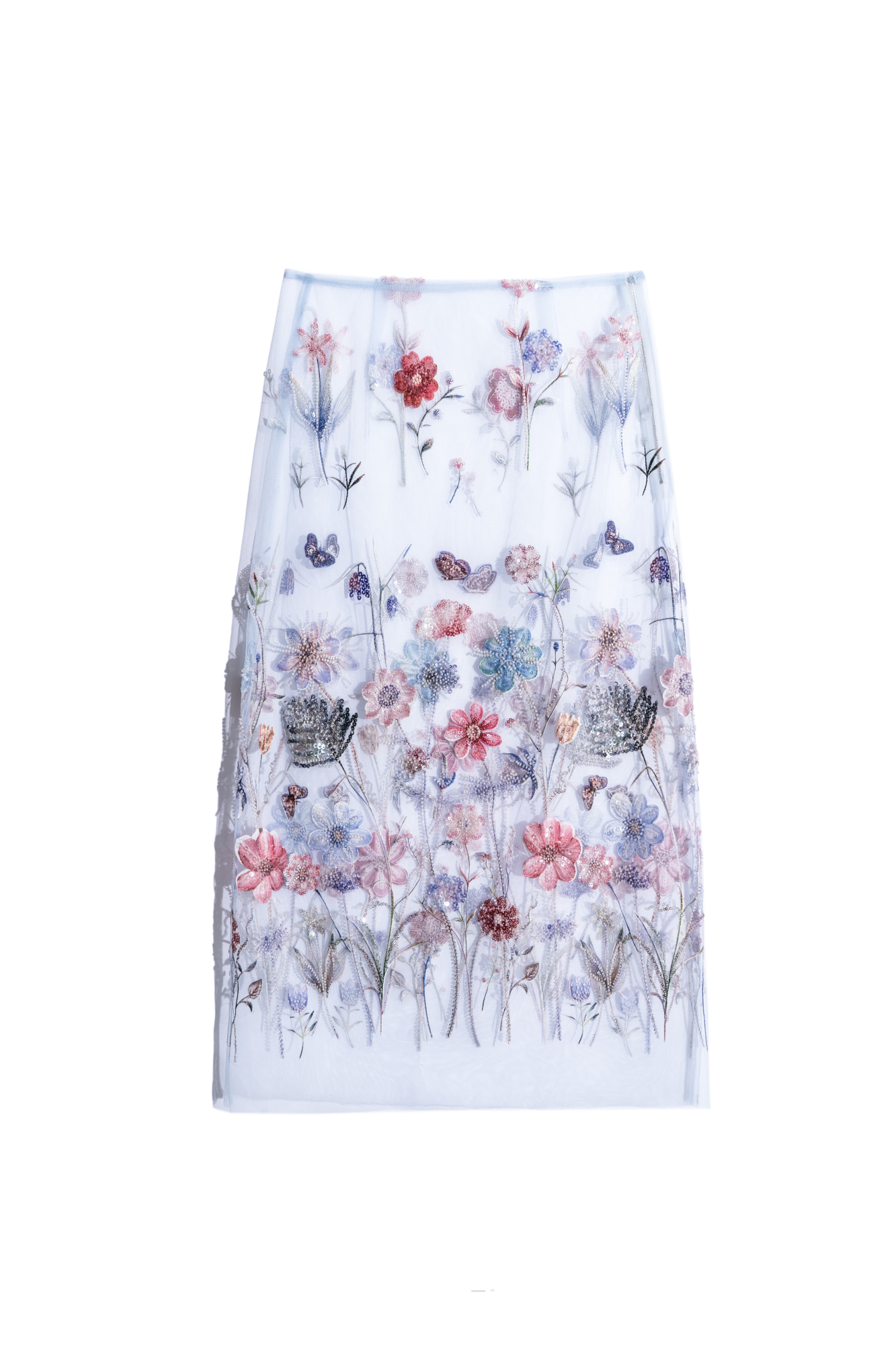 Юбка длины миди с цветочным орнаментом, вышитым пайетками и бисером. Модель без подкладки. Застежка на молнию сбоку.