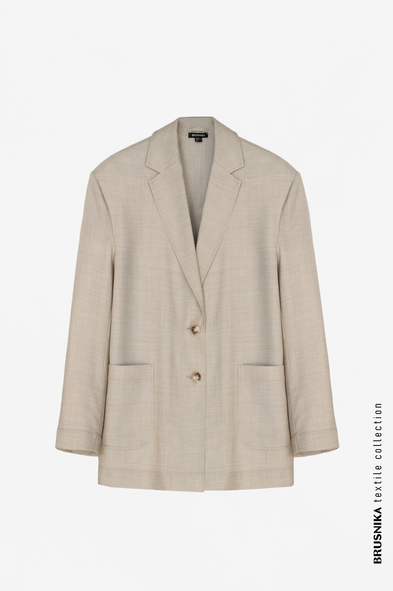 Двубортный классический жакет из шерсти с распашной спинкой. Дополнить образ можно брюками.