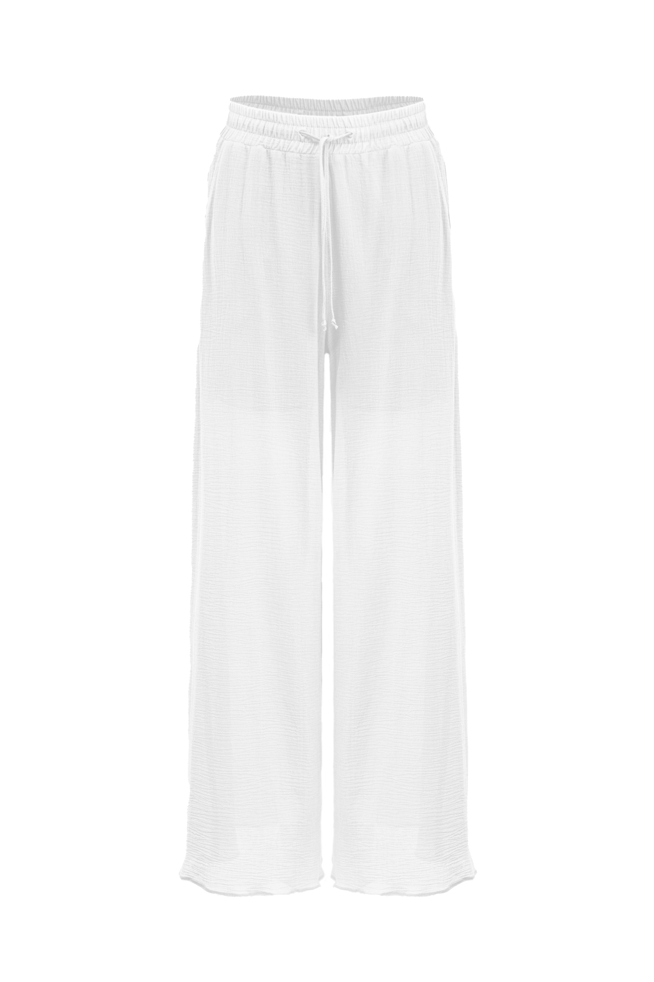 Широкие свободные брюки на кулиске из 100% хлопка с боковыми карманами.