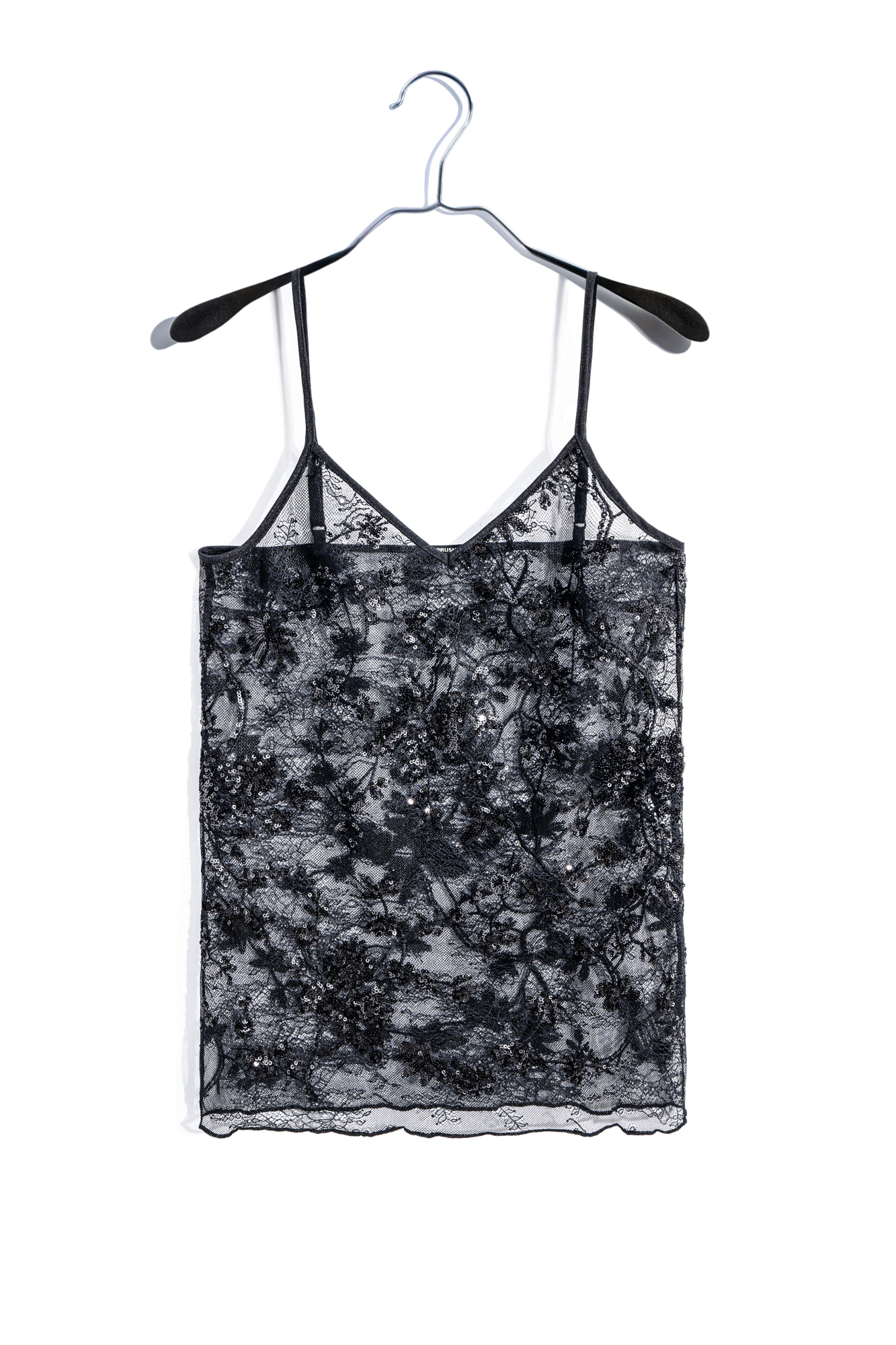 Кружевной топ с цветочным орнаментом, расшитый пайетками. Модель свободного силуэта на тонких регулируемых бретельках. 