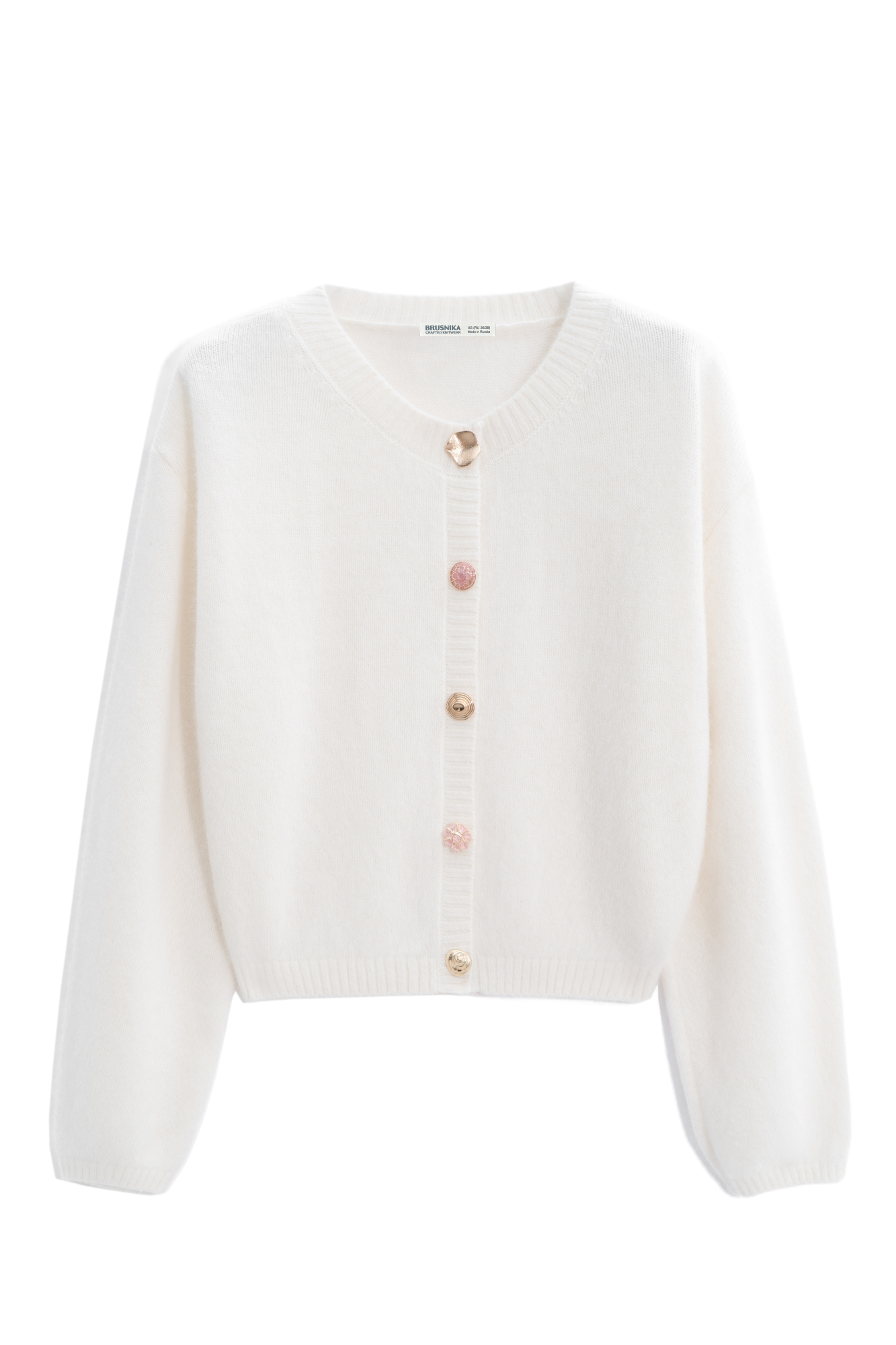 Трикотажный кардиган из пуха лисы. Модель свободного силуэта со спущенной линией плеч и круглым вырезом горловины. Изделие декорировано крупными акцентными пуговицами.