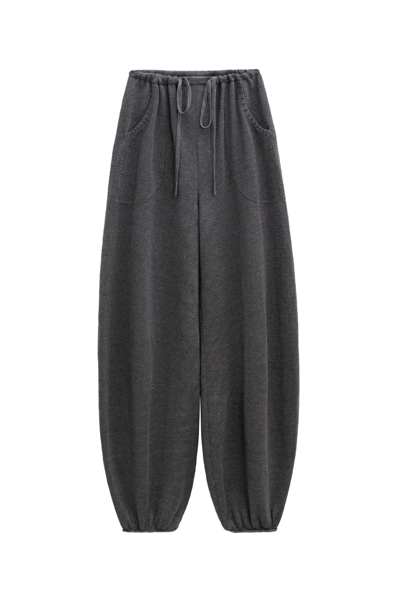 Брюки-алладины из 100% льна. Модель свободного силуэта, с поясом на резинке и двумя карманами.