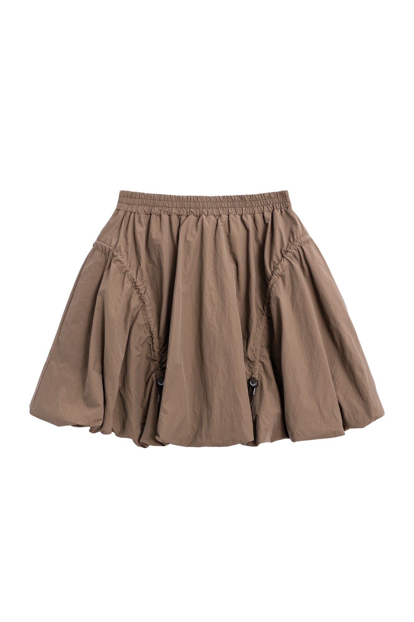 Юбка-баллон длины мини из нейлона. Модель с поясом на резинке и регулируемыми оборками по бокам.