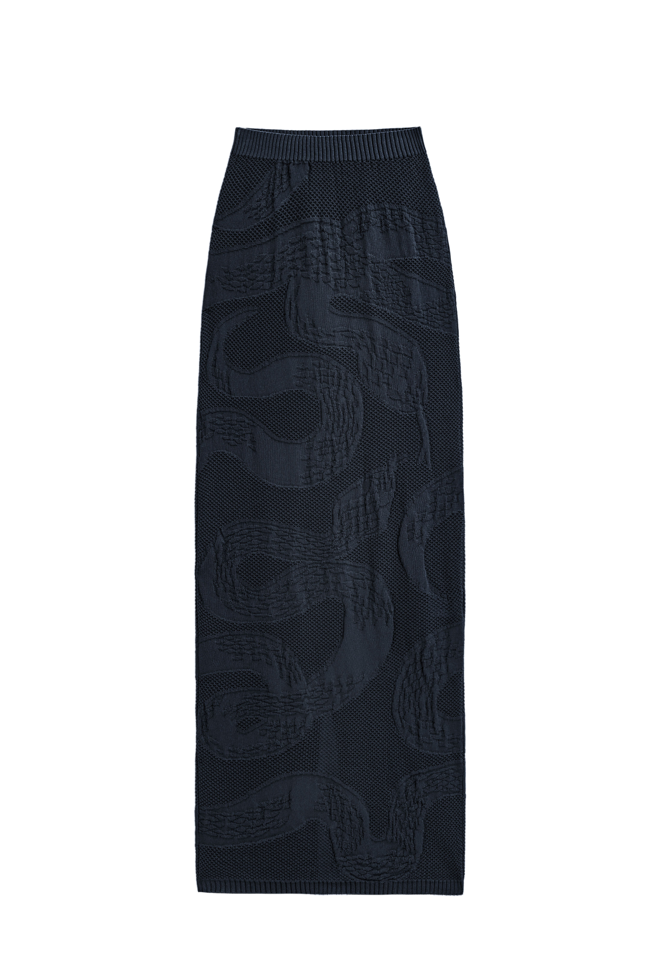 Трикотажная юбка длины макси из органического хлопка. Модель по фигуре, с широким эластичным поясом в рубчик и разрезом сзади. Изделие декорировано жаккардовым узором в виде змеи. Без подкладки.<br />
Органический хлопок - более экологичная и безопасная альтернатива обычному хлопку, выращенная без использования химикатов.