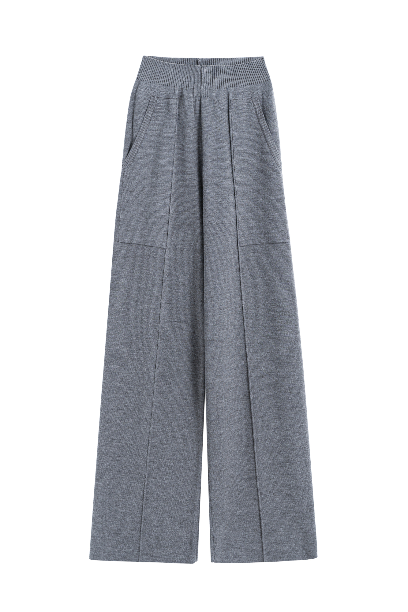 Трикотажные брюки в основе из шерсти мериноса. Модель свободного силуэта со стрелками, боковыми карманами и эластичным поясом. Дополнить образ можно комплектными жилетом и бомбером.