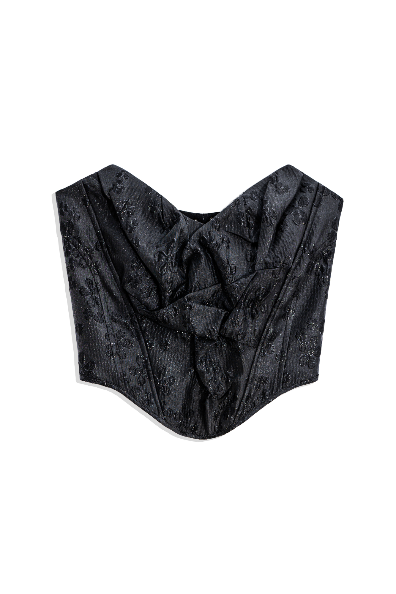 Корсет из жатого жаккарда с растительным орнаментом. Модель без бретелей, с фигурным вырезом декольте, драпировкой и объемным декором. Шнуровка на спинке через металлические люверсы.