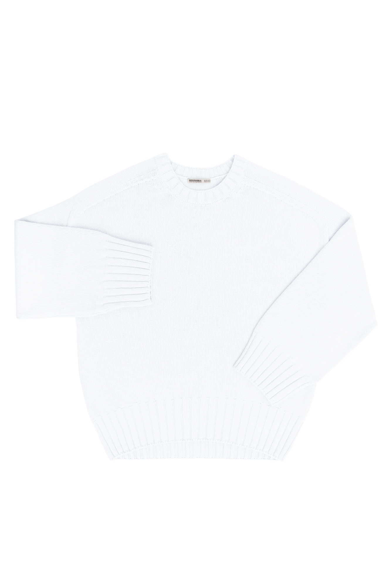 Трикотажный джемпер из 100% хлопка. Модель свободного силуэта со спущенной линией плеча и удлиненной спинкой.