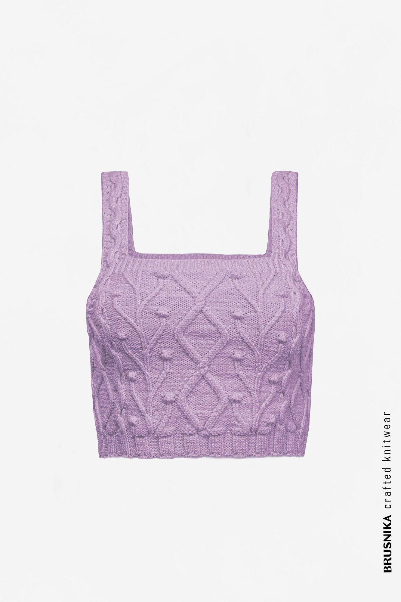 Фактурный хлопковый кроп-топ на широких лямках сочетается как с брюками, так и с юбками.