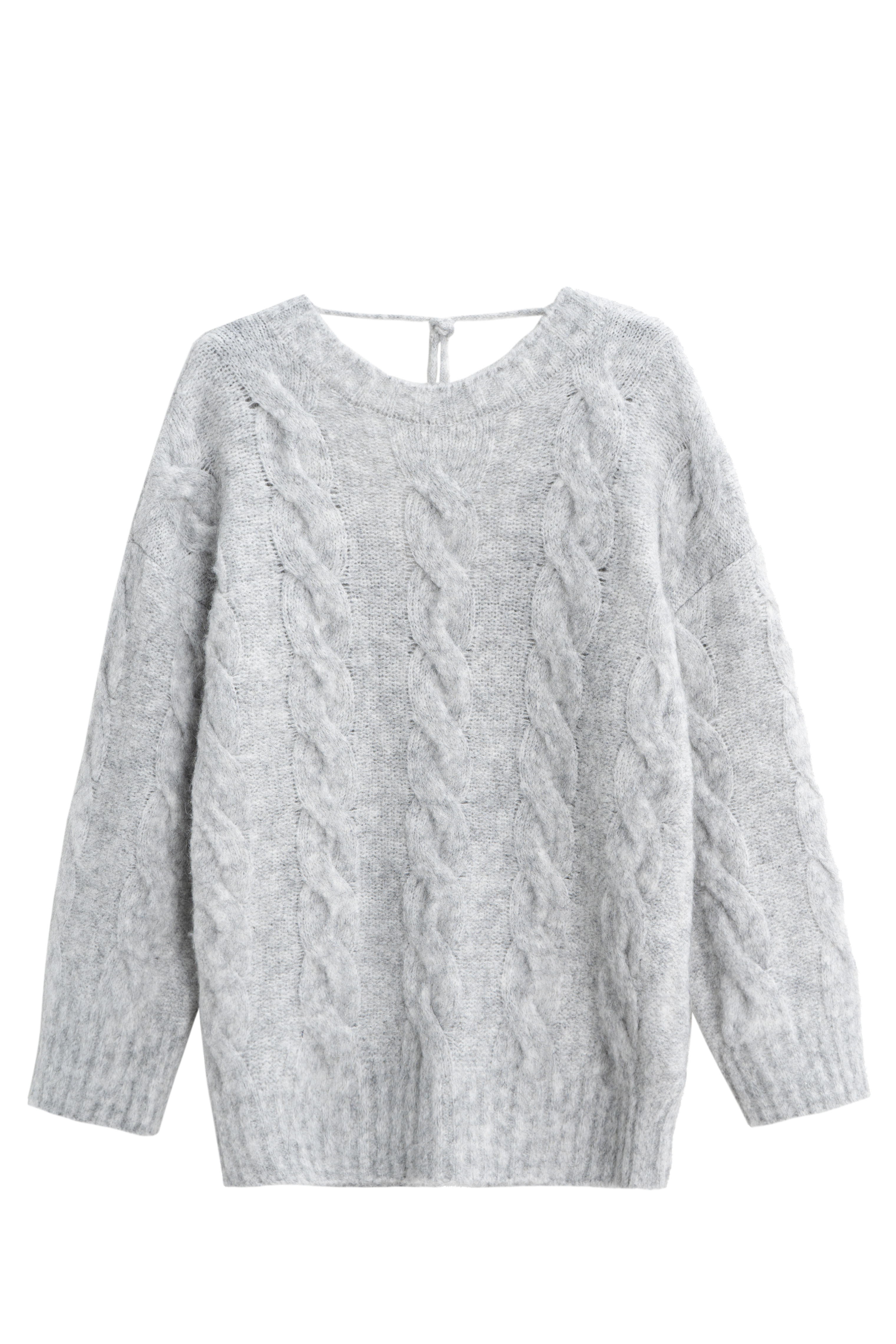 Трикотажный джемпер с открытой спиной и косами