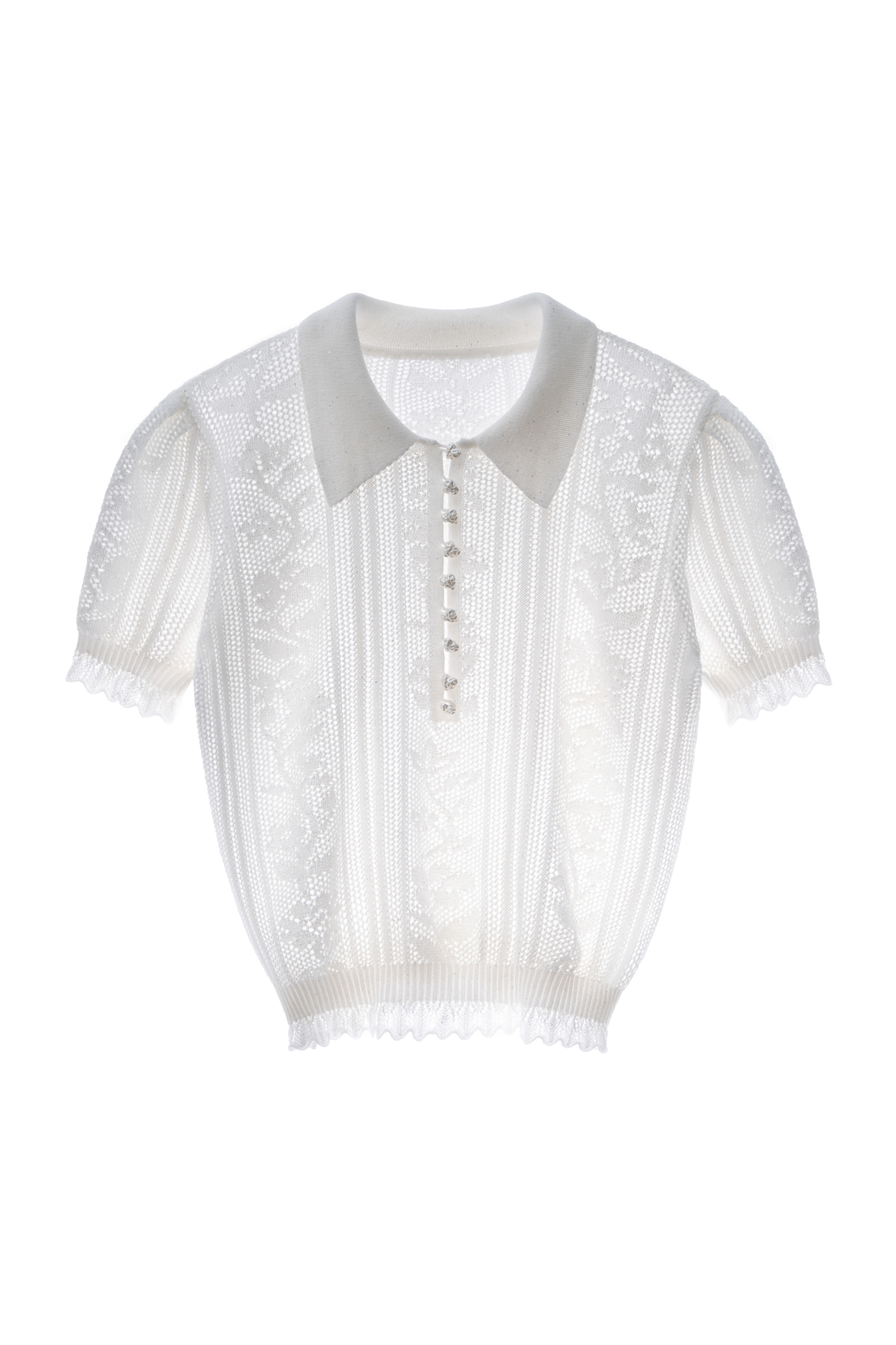Трикотажная футболка из вискозы с пайетками. Изделие выполнено ажурным переплетением с дизайном в виде растительного орнамента. Модель с воротником-поло, планкой на пуговицах-сердечках и коротким рукавом.