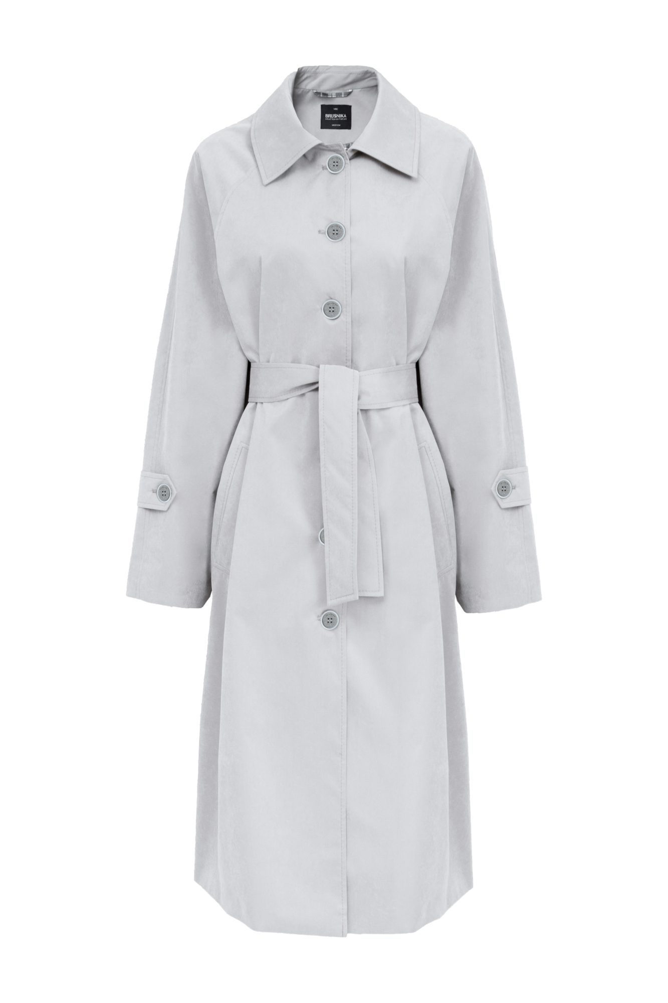 Oversize тренч с декоративными разрезами по бокам. Подкладка из клетчатой ткани, широкий пояс из основного материала, боковые карманы. Длинные рукава с патами на манжетах и разрезами. Застежка на пуговицы.