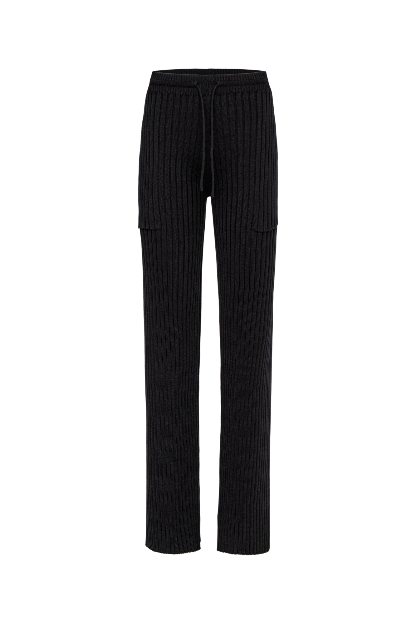 Трикотажные широкие брюки в рубчик с накладными карманами и эластичном поясом на кулиске. Дополнить образ можно джемпером в таком же стиле.