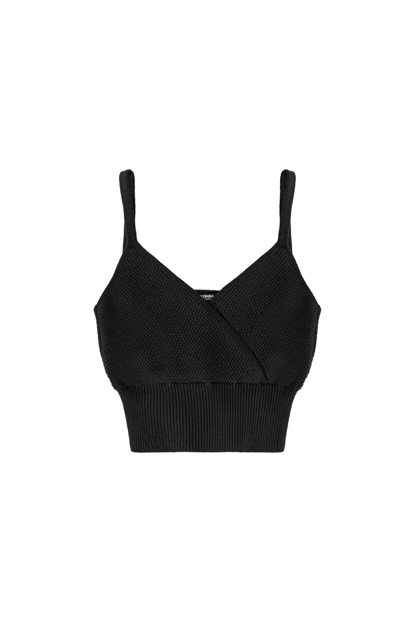 Фактурный кроп-топ из вискозы на тонких бретелях. Модель с имитацией запаха на лифе и широкой эластичной резинкой.