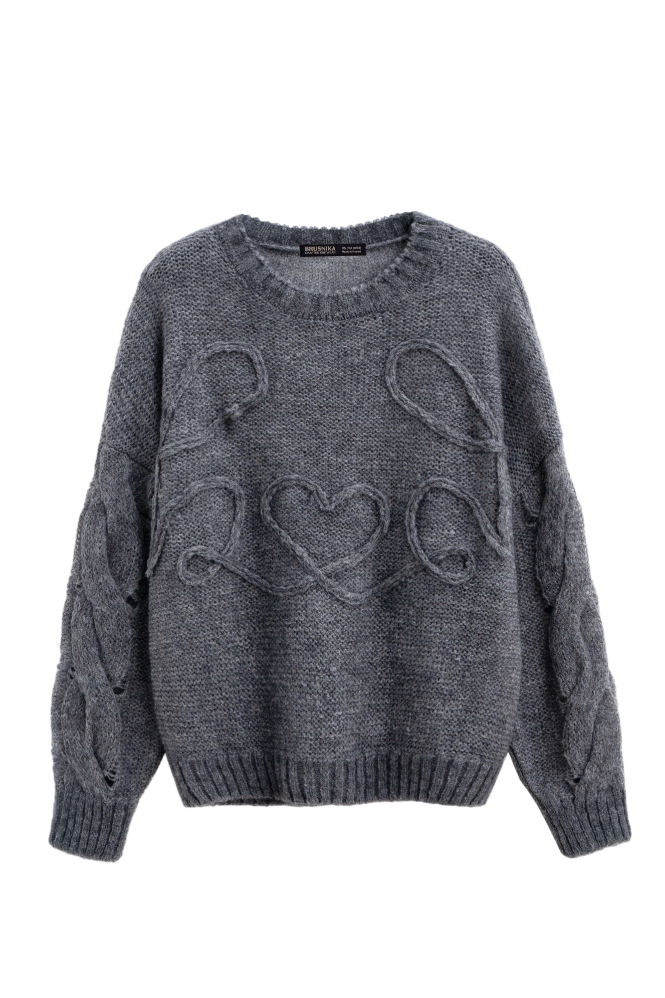 Трикотажный джемпер из шерсти и мохера. Модель свободного силуэта со спущенной линией плеча и круглым вырезом горловины. Изделие декорировано вывязанными косами на рукавах и вензелем в виде сердца на груди.