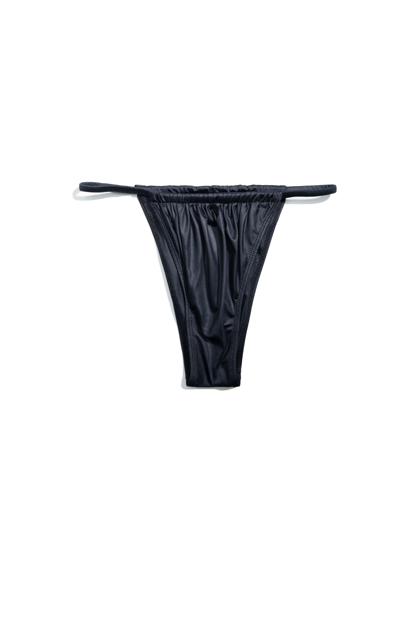 Плавки бразилиано с тесемками по бокам.