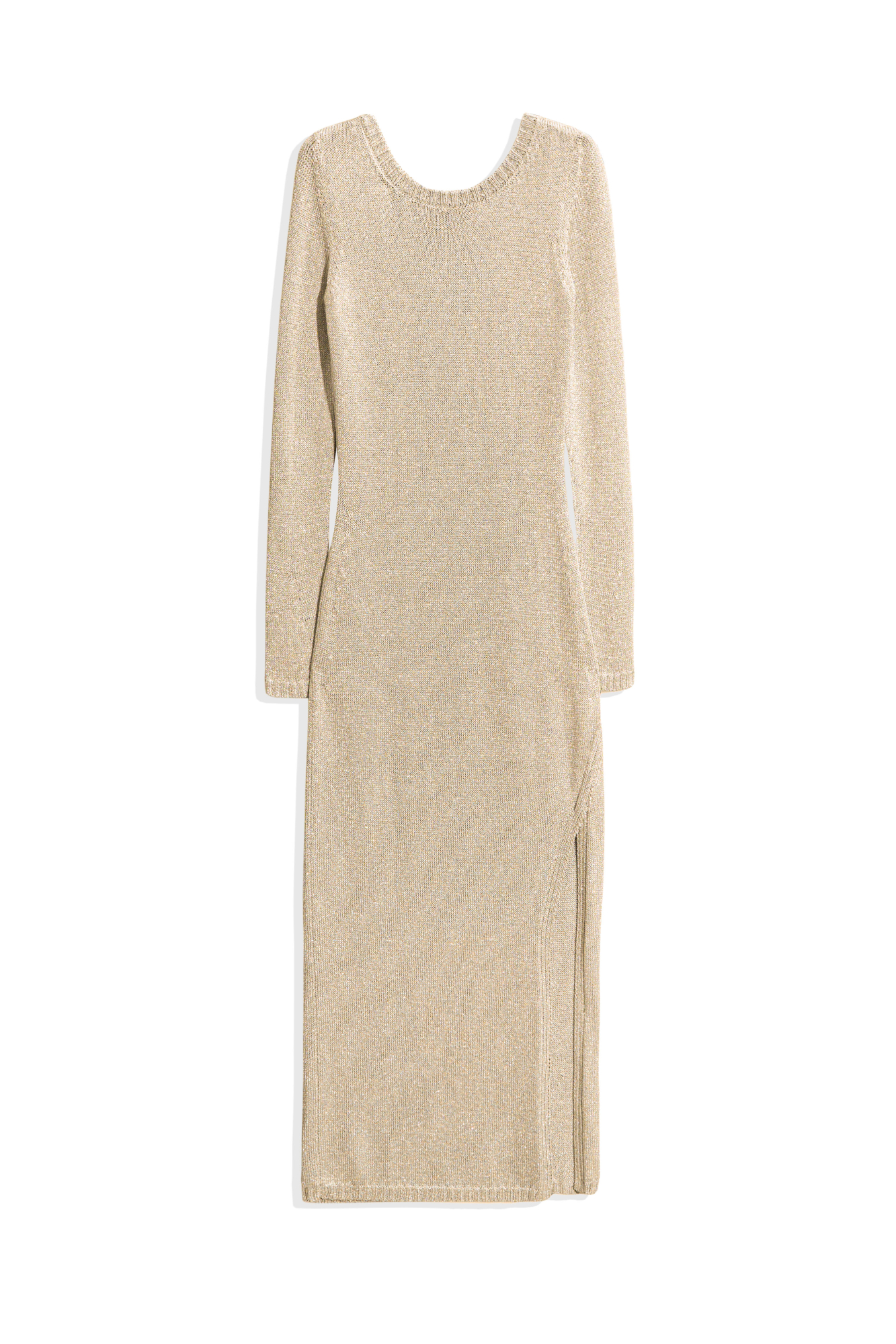 Трикотажное платье длины макси из вискозы с добавлением люрекса. Модель по фигуре с длинными рукавами, круглым вырезом горловины, вырезом на спине и разрезом на подоле сбоку. Края изделия выполнены в рубчик.