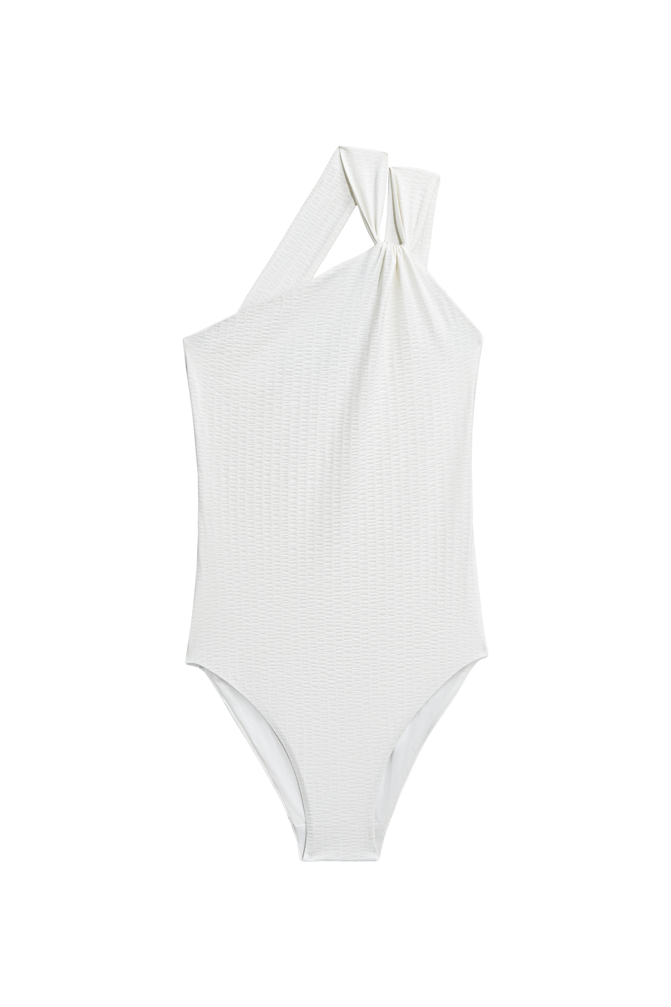 Слитный купальник с асимметричным верхом. Модель выполнена из текстурного материала. 