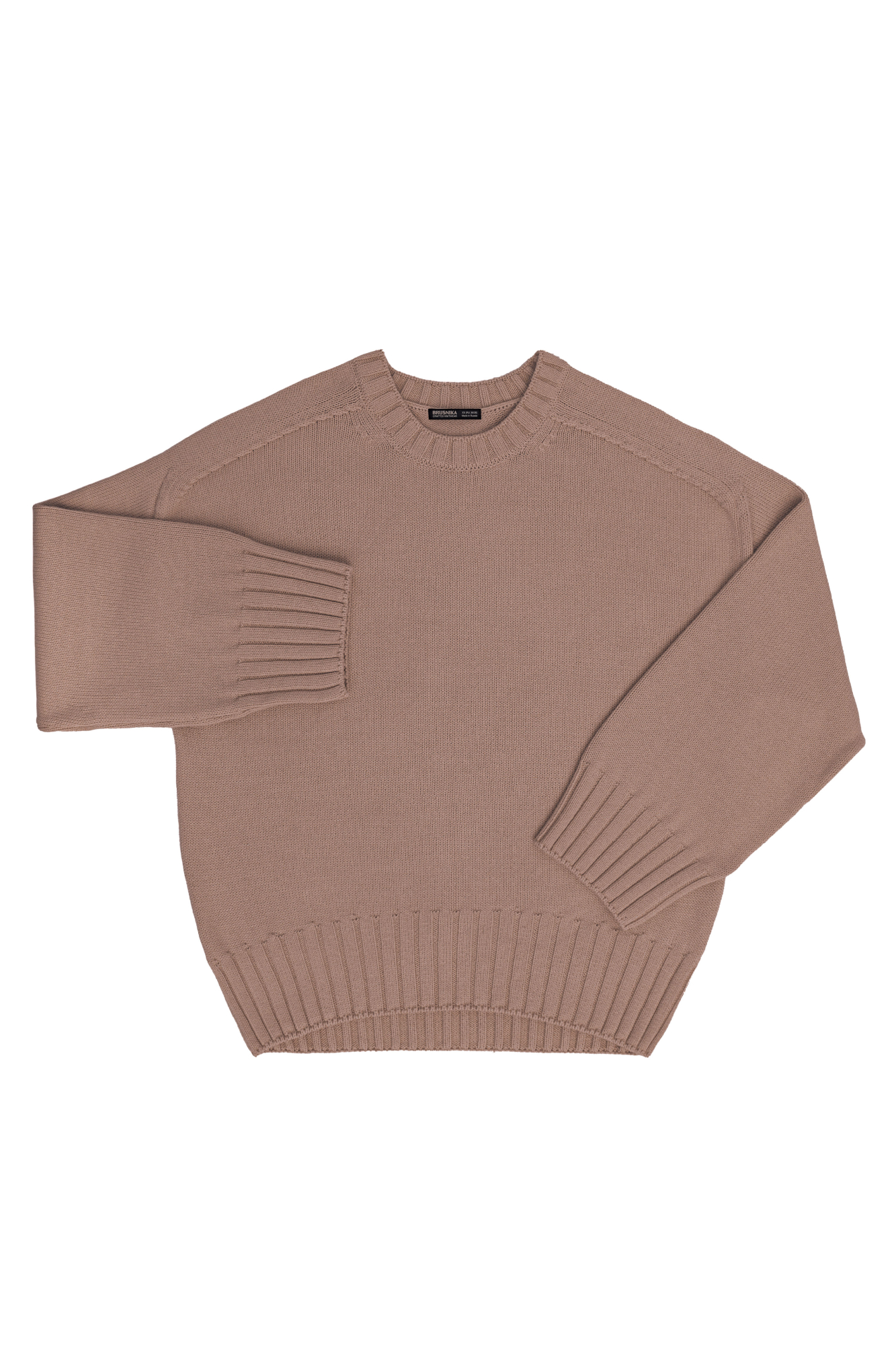 Трикотажный джемпер из 100% хлопка. Модель свободного силуэта со спущенной линией плеча и удлиненной спинкой.