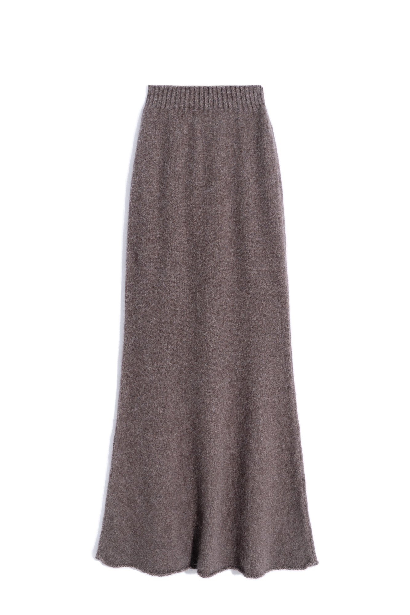 Трикотажная юбка длины макси из пуха лисы. Модель А-силуэта, с эластичным поясом на резинке и валиком по низу подола. Дополнить образ можно джемпером в таком же стиле.