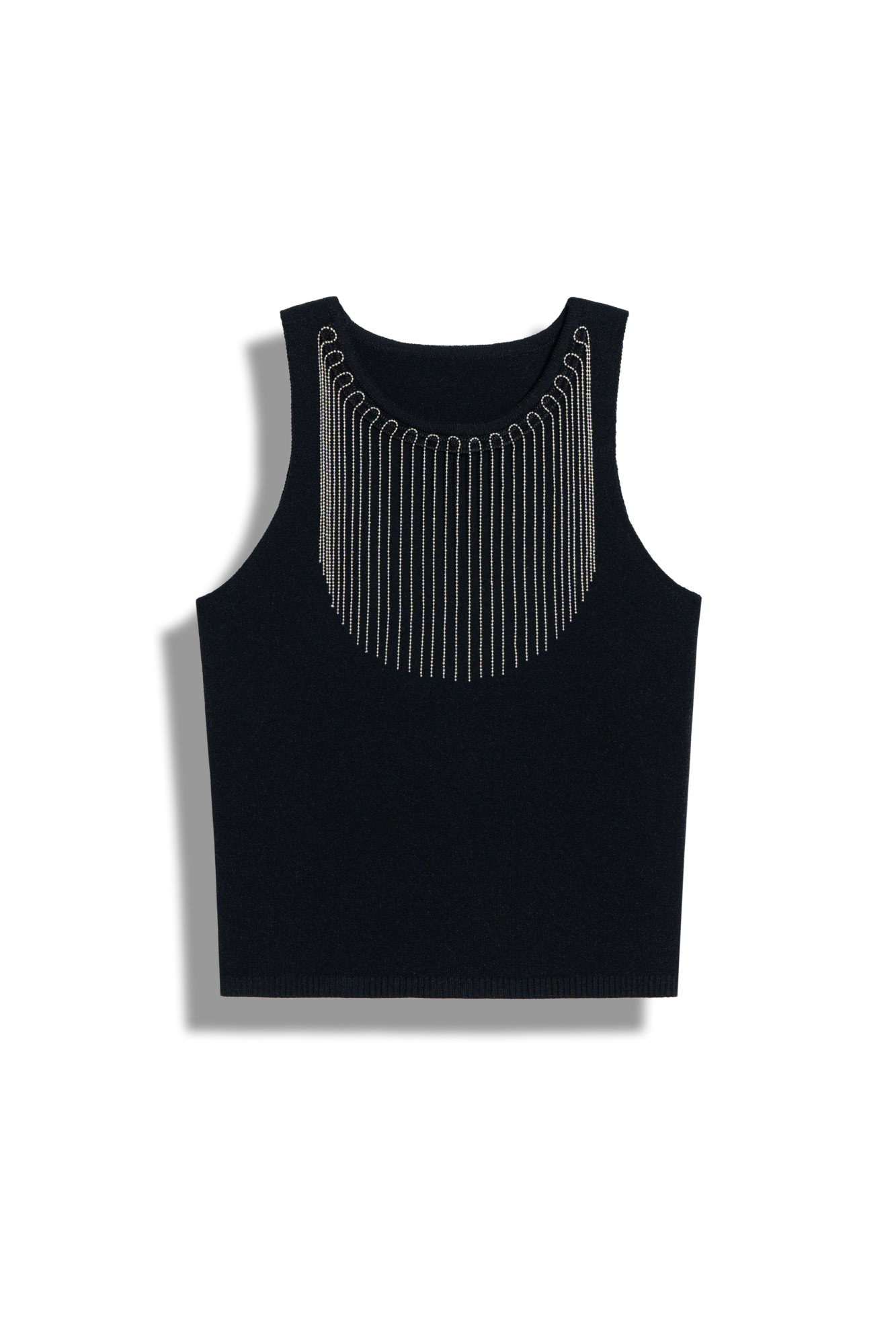 Трикотажный топ с бисером. Модель приталенного силуэта из вискозы. Края изделия в рубчик. Дополнить образ можно брюками.