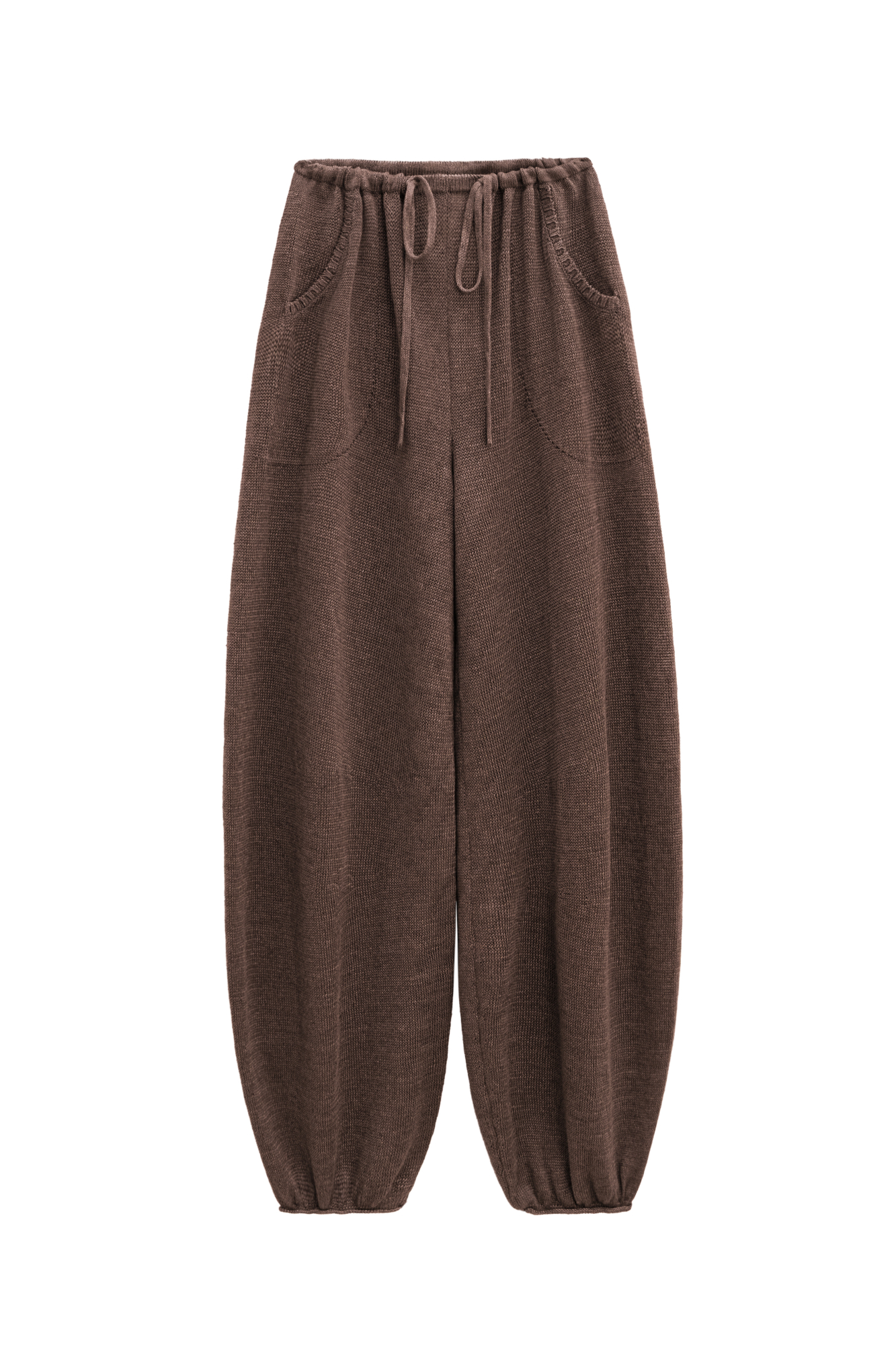 Брюки-алладины из 100% льна. Модель свободного силуэта, с поясом на резинке и двумя карманами.