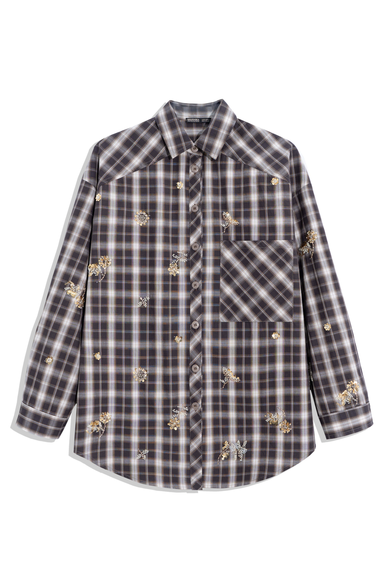 Рубашка в клетку из хлопка, декорированная вышивкой из пайеток и бисера. Модель с длинными рукавами, манжетами на пуговицах, классическим отложным воротником, нагрудным карманом и застежкой на пуговицы. 