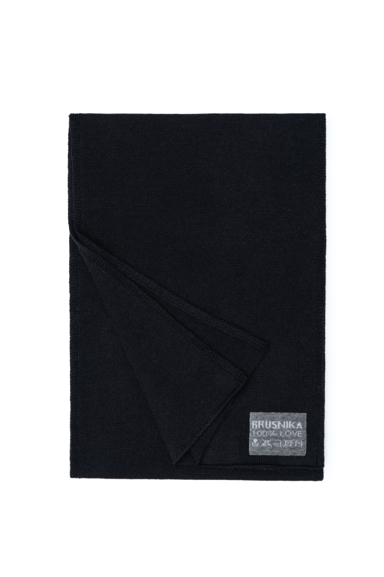 Трикотажный шарф из шерсти альпака с брендированным ярлыком.