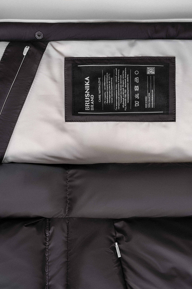 Объемный пуховик с большими карманами