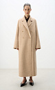 Двубортное шерстяное пальто свободного силуэта с английским воротником, боковыми карманами и застежкой на пуговицы. При изготовлении изделия была использована технология Double Face - обе стороны ткани можно использовать в качестве лицевой, швы внутри пальто выполняются вручную, чтобы избежать видимых строчек на лицевой стороне и сохранить элегантный вид.