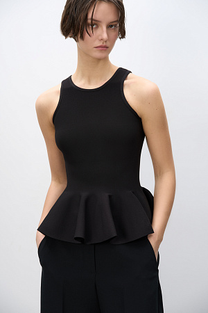 черный Трикотажный корсет из матовой вискозы. Модель на широких бретельках с баской. Застежка на молнию сзади. Изделие без подкладки.