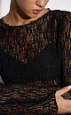 Кружевной лонгслив, декорированный пайетками. Модель по фигуре с горловиной лодочкой.