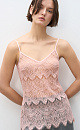 Топ из тонкого кружева. Модель с треугольным лифом, на регулируемых бретельках. Изделие выполнено без подкладки.