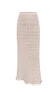 Трикотажная юбка длины макси на эластичном поясе с кулиской. Модель декорирована тесьмой с крупными бусинами. Дополнить образ можно джемпером в таком же стиле.