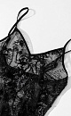 Кружевной топ с цветочным орнаментом, расшитый пайетками. Модель свободного силуэта на тонких регулируемых бретельках. 