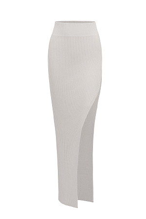 бежевый Трикотажная юбка длины макси с разрезом. Облегающий силуэт из вискозы с эластичным поясом в рубчик. Дополнить образ можно топом с открытой спиной из этой же коллекции.