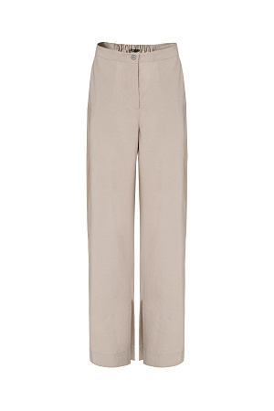бежевый Брюки из купры с разрезами по бокам. Модель свободного силуэта с застежкой на молнию и пуговицу.