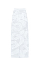 Трикотажная юбка длины макси из органического хлопка. Модель по фигуре, с широким эластичным поясом в рубчик и разрезом сзади. Изделие декорировано жаккардовым узором в виде змеи. Без подкладки.<br />
Органический хлопок - более экологичная и безопасная альтернатива обычному хлопку, выращенная без использования химикатов.