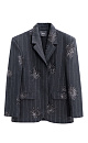 Однобортный жакет из шерсти, декорированный узором из пайеток. Модель прямого кроя с узкими лацканами, широкими плечами, боковыми карманами с клапанами и застежкой на две пуговицы. Изделие выполнено на подкладке.