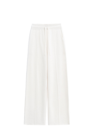 молочный Трикотажные брюки из смесовой шерсти. Модель свободного силуэта со средней посадкой, боковыми карманами и стрелками. Эластичный пояс на кулиске в рубчик.