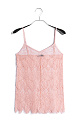 Топ из тонкого кружева. Модель с треугольным лифом, на регулируемых бретельках. Изделие выполнено без подкладки.