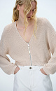 Трикотажный кардиган из 100% хлопка. Модель укороченного силуэта, со спущенной линией плеч, V-вырезом и застежкой на молнию.
