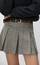 Юбка длины мини в клетку гленчек из шерсти. Модель прямого кроя, с крупными складками, поясом со шлевками для ремня, врезными карманами спереди и застежкой на молнию. Изделие без подкладки.