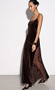 Бархатное платье длины макси с кружевными вставками и вырезом на спине. Модель приталенного силуэта на тонких бретельках. Без застежки.
