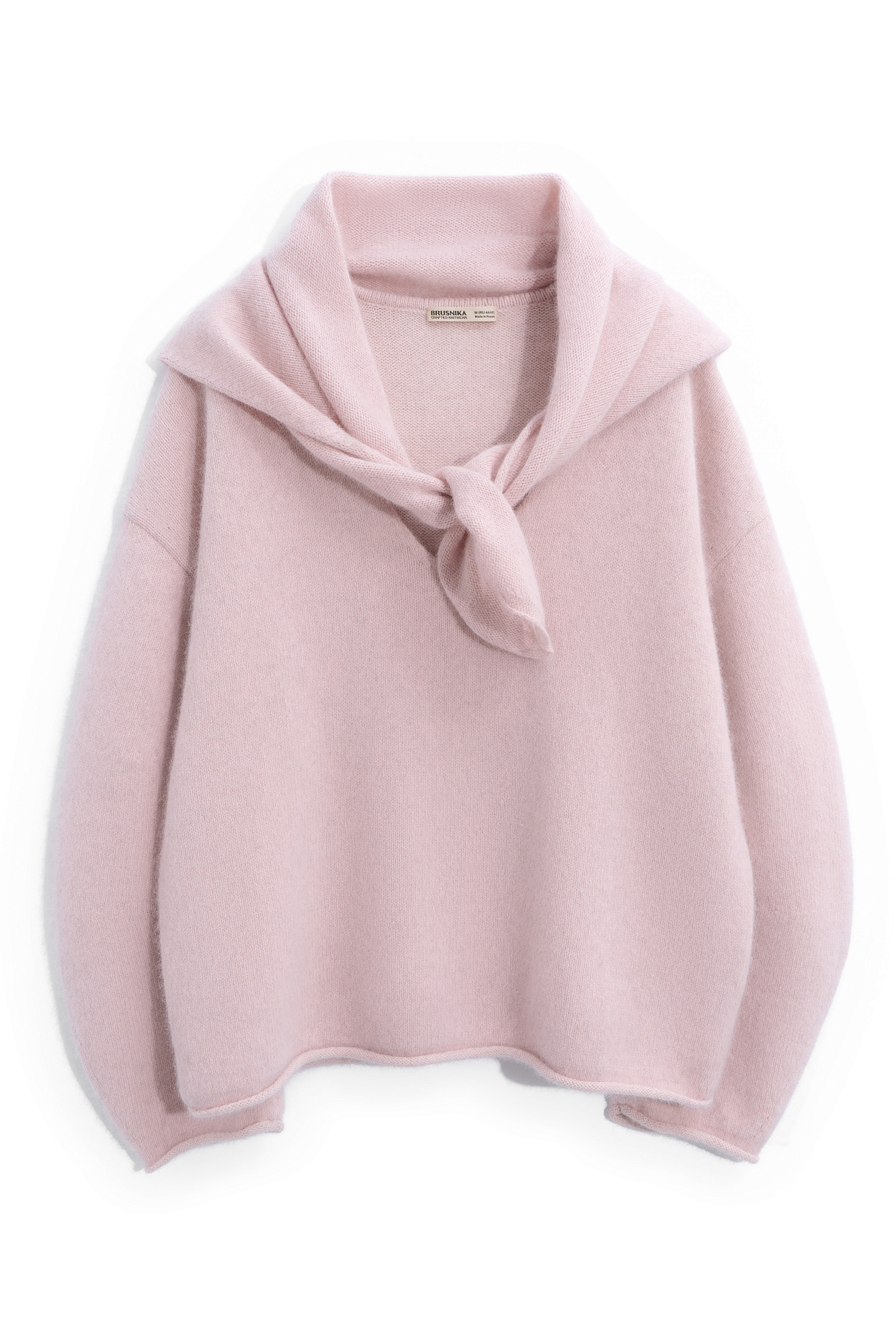 Объемный трикотажный джемпер из пуха лисы. Модель с глубоким V-образным вырезом горловины, спущенной линией плеч, длинными широкими рукавами и валиками по низу. Дополнить образ можно юбкой.