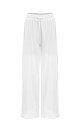 Широкие свободные брюки на кулиске из 100% хлопка с боковыми карманами.